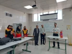 برگزاری آموزش تئوری اطفای حریق و نحوه کار با کپسول آتش‌نشانی به مناسبت هفته پدافند غیرعامل در دانشکده ملی مهارت دختران سمنان 4